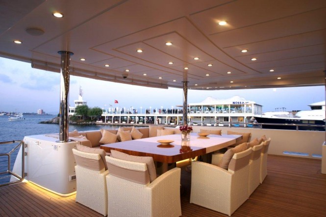Luxurious exterior aboard the 45m superyacht Tatiana - al fresco dining area