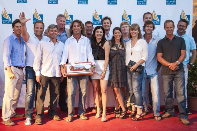 Maria Cattiva superyacht's crew taking over the Superyacht Cup Palma 2012 Trophy Photo Credit Claire Matches