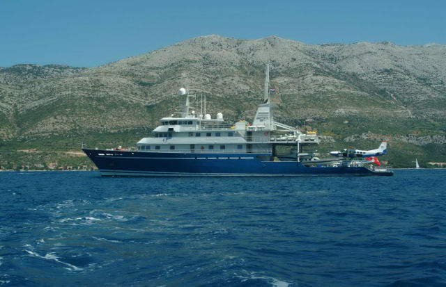 Golden Shadow superyacht at anchor off the Croatian coast, showing the seaplane 'Golden Eye' on her stern platform