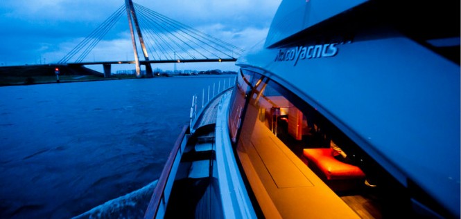 Luxury yacht AY74 by night