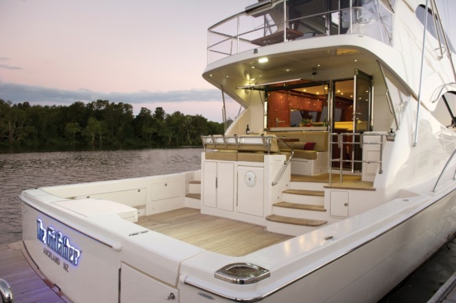 The luxury yacht 75 Enclosed Flybridge's large cockpit is excellent for sport fishing and entertaining