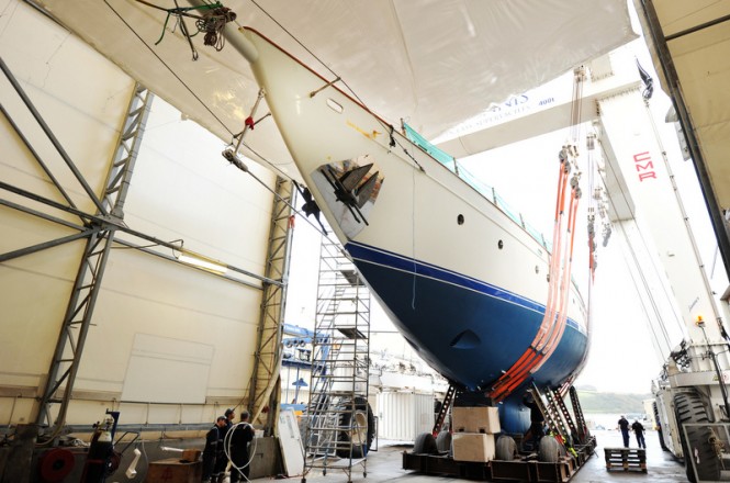 Gloria superyacht being hauled out of the Pendennis refit tent