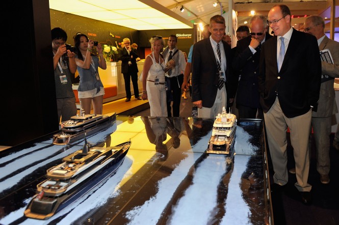 The Sovereign Prince of Monaco stopped in front of the 65m CMN yacht models - Photo by Bruno Bebert