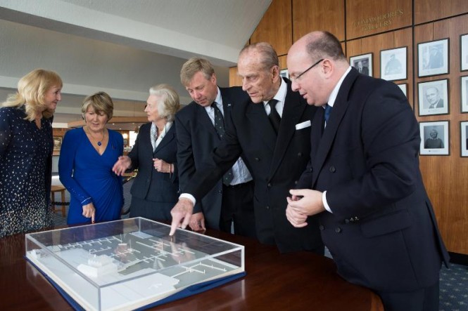 HRH The Duke of Edinburgh discusses plans for the proposed Yacht Haven at the Royal Southern Yacht Club today flanked by the Club's Commodore Mark Inkster on his left and Ian Redsell, Commodore, RAF Yacht Club (right). Also being shown the model are L-R Frances Redsell, Yvonne Curtis and Dame Mary Fagan, Lord Lieutenant of Hampshire. Photograph: Michael Austen