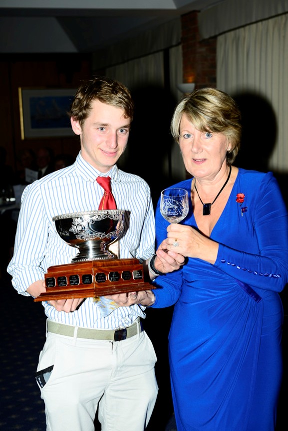 Andrew Sinclair was recently awarded the Royal Southern's William Sparshatt-Worley Memorial Trophy for 2012, seen here being presented by Yvonne Curtis . Photo: Waterline Medi