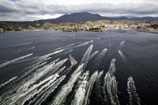 The first yacht to finish receives a royal welcome in Hobart - Photo credit Rolex Daniel Forster