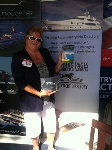 Kathleen is distributing copies of Yachting Pages and SYOG at Palm Beach Boat Show