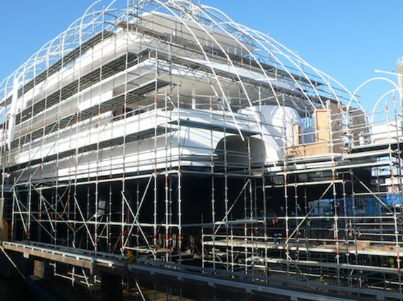 Scaffolding around White Rabbit Echo yacht, in preparation for work