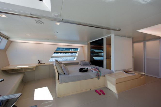 Wally yacht Better Place - Owners suite port side with lounge and TV  area - Photo by Toni Meneguzzo