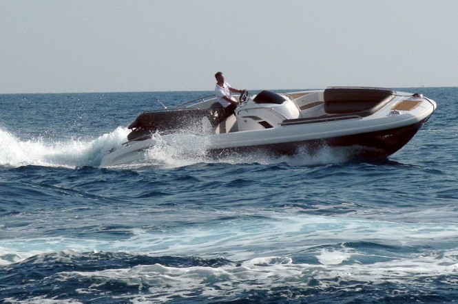 HTM 825 Open yacht tender to Stella Maris Yacht at full speed