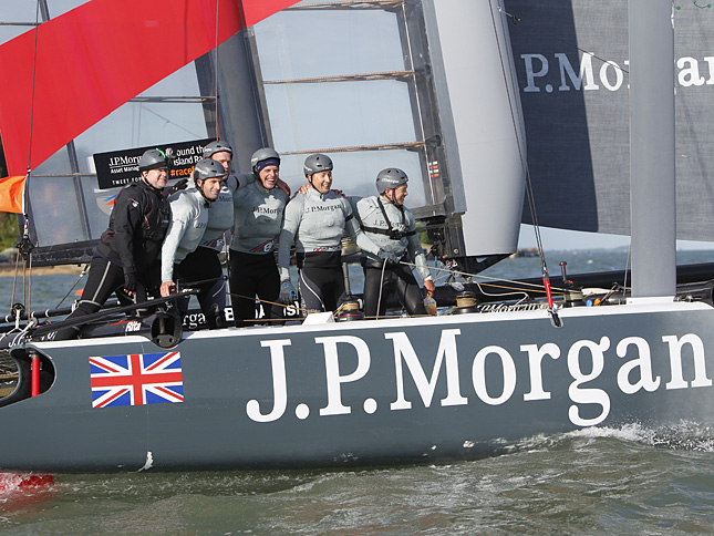 Ben and his team on J.P.Morgan BAR celebrate their fabulous record-breaking achievement right after crossing the line in today's J.P. Morgan Asset Management Round the Island Race. Photo: Patrick Eden