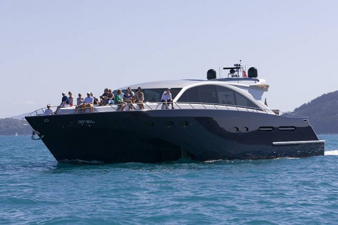 Spectators on luxury yacht Andiamo