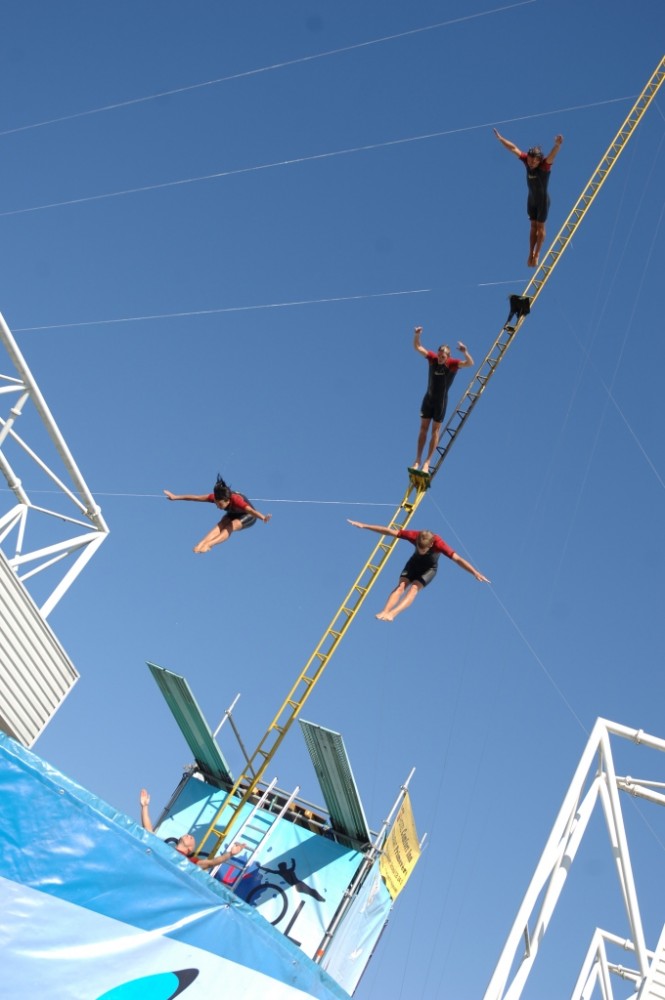The high divers will perform a daring act from great heights
