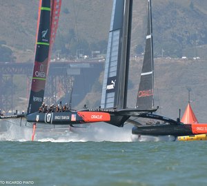 34th America's Cup: ORACLE TEAM USA captures Race 12 to stay alive