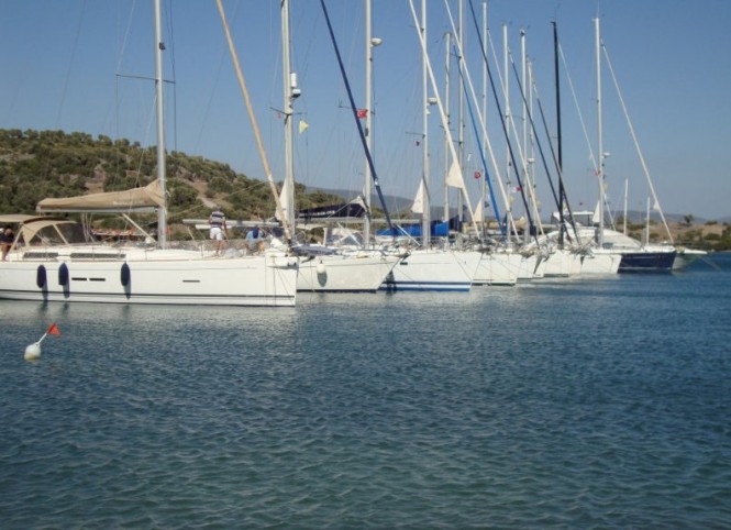 First luxury yachts anchored at Port Iasos Marina