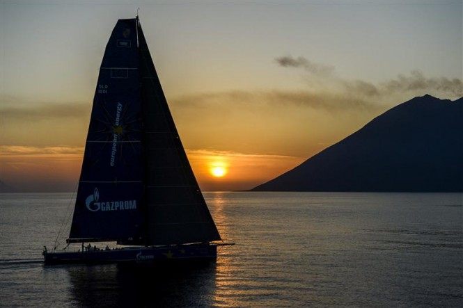 Superyacht Esimit Europa 2 approaching Stromboli at sunset