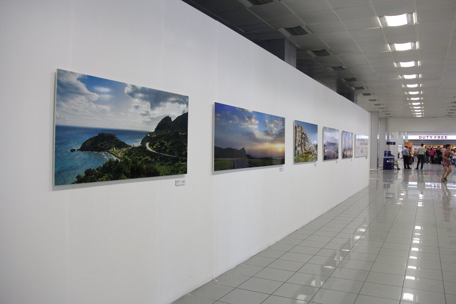 The ‘Karpaz: Untapped Beauty’ exhibition by Dudu Tresca on display in the departure and arrival section of Northern Cyprus’s Ercan Airport