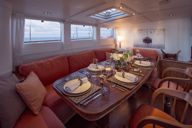 Pumula Yacht - main deckhouse dining - Photo by Cory Silken