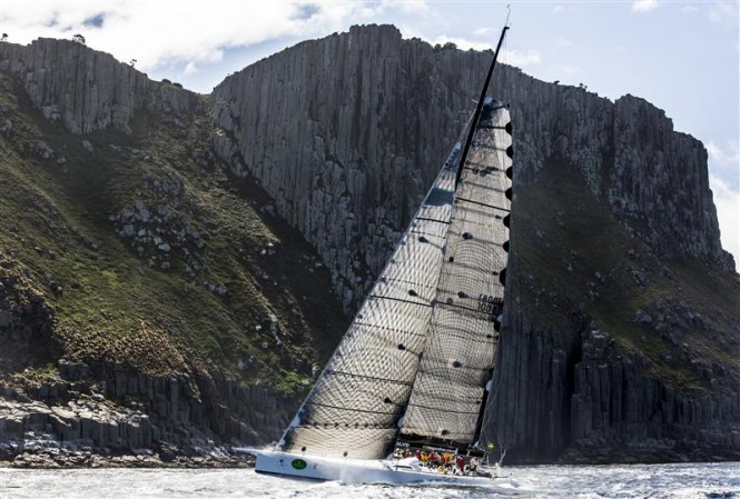 Sailing yacht Ragamuffin Loyal passes beneteah cliffs of Tasman Island - Photo by Rolex Daniel Forster