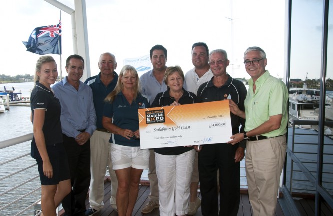 The Expo Committee presents the cheque to Sailability
