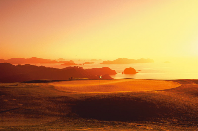 Golf Green with Cavallis Sunrise - Image credit Kauri Cliffs