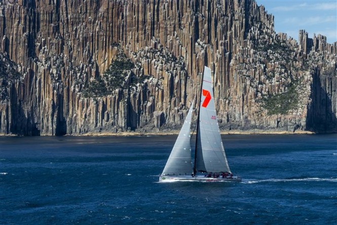 Superyacht Wild Oats XI passing Tasmania's iconic Organ Pipes