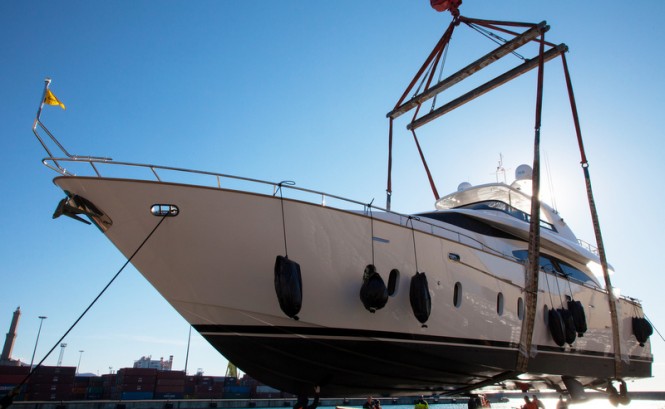 A superyacht is lifted on to the deck of one of Sevenstar Yacht Transport's ships