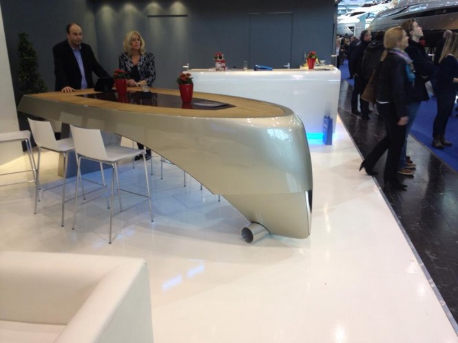 Storm Table: a centrally situated table in the form of the characteristic Storm S-78 yacht hull