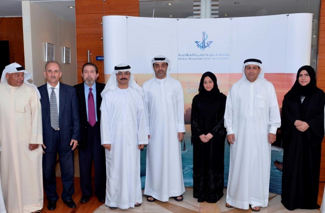 H.E. Sultan bin Sulayem, Chairman of Dubai Ports, Customs and Free Zone Corporation and President of Dubai Maritime City Authority, with the work team in power while checking the progress of work in Dubai’s maritime sector