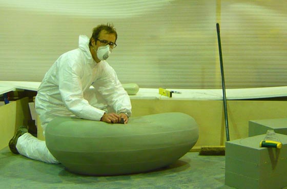 Adam Lay sculpting Inukshuk yacht's saloon ottoman boulders - January 2013 Adam Lay sculpting Inukshuk yacht's saloon ottoman boulders - January 2013