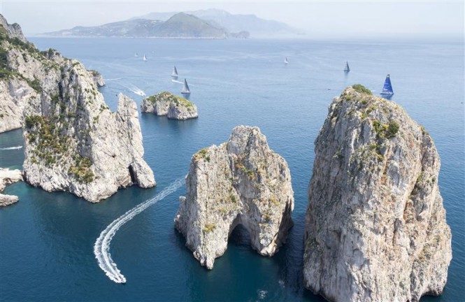 Capri's dramatic Faraglioni with the mainland in the distance. Photo by Rolex Carlo Borlenghi