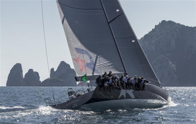 Luxury yacht Robertissima III approaching Capri to finish the Volcano Race of the Rolex Capri Sailing Week - Photo credit to Rolex Carlo Borlenghi