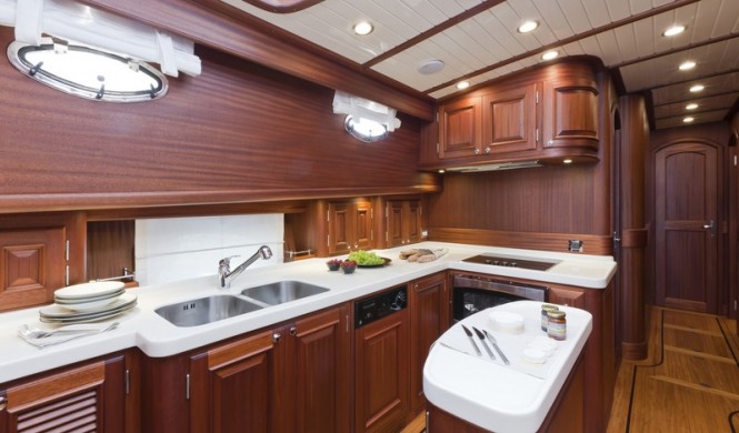 V77 Flybridge Yacht - Galley - Photo by Alberto Cocchi