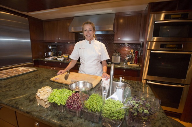 Chef Esther Rupenovic in the galley of the 151-foot motor yacht Katya where she prepared her winning "Best Charter Yacht" dish of smoked mussels and clams, pickled beets, horseradish and soba noodles during the 2014 Newport Charter Yacht Show