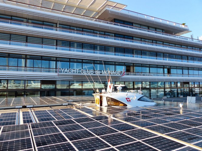 PlanetSolar in front of Yacht Club de Monaco