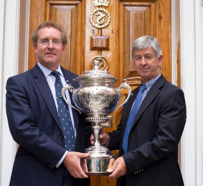 (left to right) RORC Commodore, Mike Greville & Chief Executive, Eddie Warden Owen with the  magnificent antique 1928 RORC Transatlantic Race Trophy for the Overall Winner in IRC  Credit: RORC/onEdition