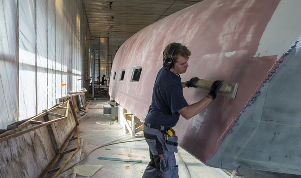 Skill, dedication and precision are key elements at Oy Nautor Ab. In a world ruled by machines, the human touch is still the most important ingredient for excellency. Working on the hull of Swan 115-001 at BTC in Pietarsaari, Finland.