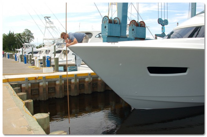 Viking's Joe Snodgrass takes bow and stern waterline measurements Viking's Joe Snodgrass takes bow and stern waterline measurements
