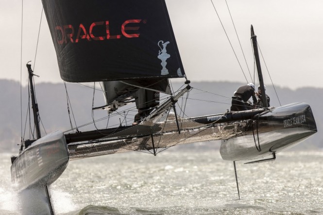 An ORACLE TEAM USA foiling AC45 during testing in 2013. Photo by Guilain Grenier