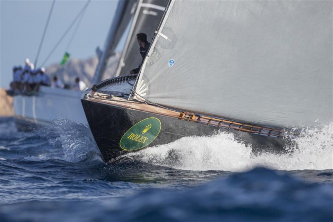 Bowman watching the competitors from the bow of FIREFLY (NED) - Photo by Rolex Carlo Borlenghi