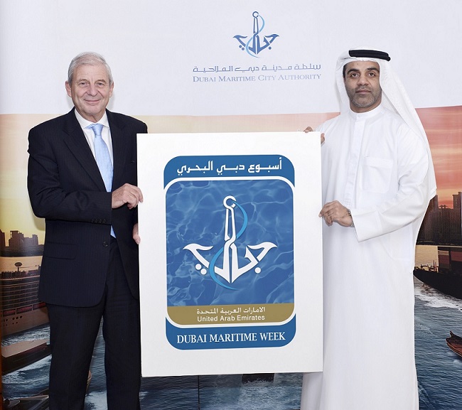 Amer Ali, Executive Director of DMCA, and Chris Hayman, Chairman of Seatrade Communications, with corporate identity of Dubai Maritime Week