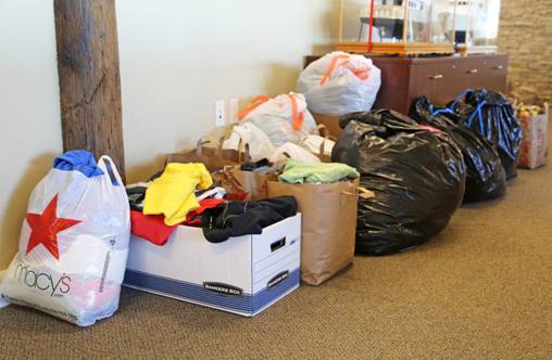 Donations line the hallway at PAE’s headquarters