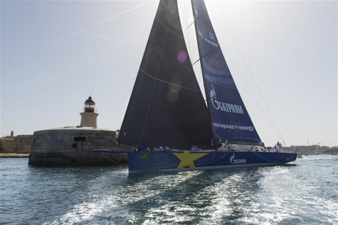 ESIMIT EUROPA 2 (SLO) leaves Grand Harbour to start the hunt for her fourth Line Honours victory - Photo by Rolex Kurt Arrigo