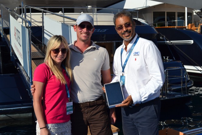 GMC and Yachting Pages awarding an iPad mini to Daniel from superyacht Starling