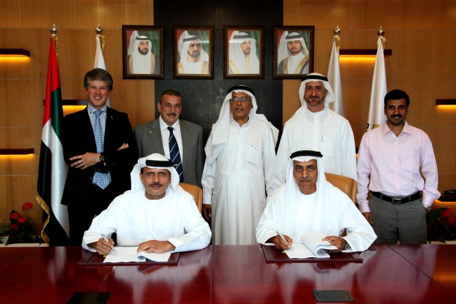 Gulf Craft and DMC Officials during the agreement