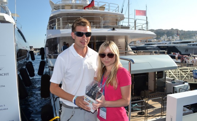 Michelle from Yachting Pages awarding a GoPro camera to Chris from Blush