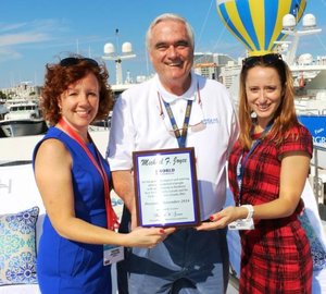CEO of Hargrave Custom Yachts receives Award from the 1 World Foundation during Fort Lauderdale Boat Show