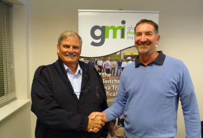GMI Chairman Mick Bettesworth congratulating John Hogan on his appointment to the GMI 