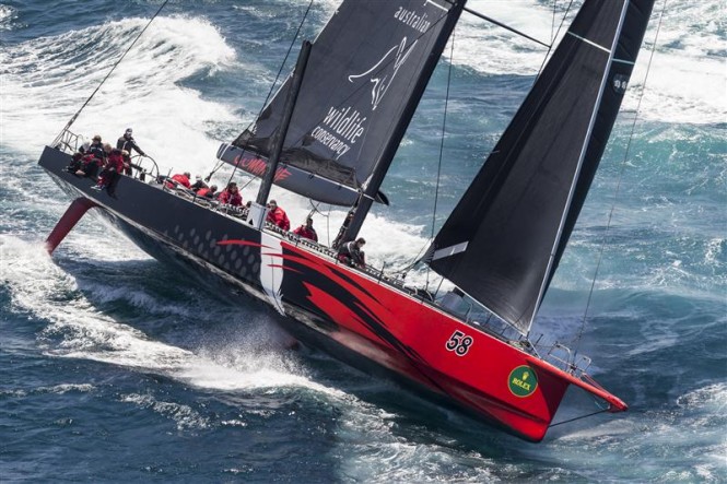 COMANCHE (USA) leading the fleet after the start of the 70th Rolex Sydney Hobart - Photo by Rolex Carlo Borlenghi