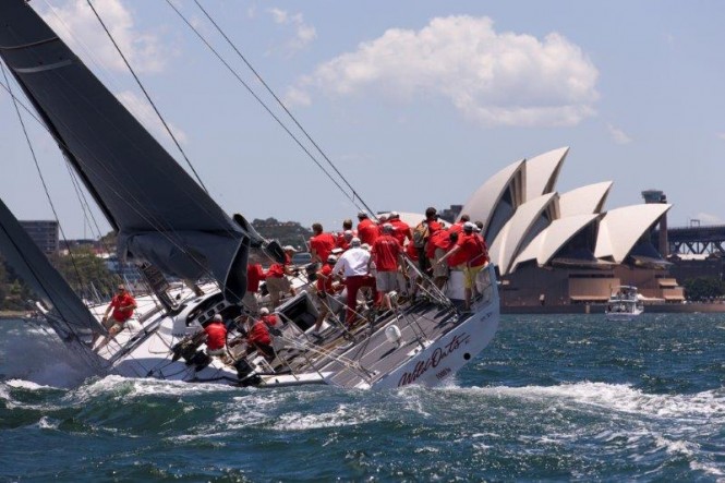 Superyacht Wild Oats XI closes on the finish line – and her seventh win – in the 2013 SOLAS Big Boat Challenge on Sydney Harbour. Image by Andrea Francolini